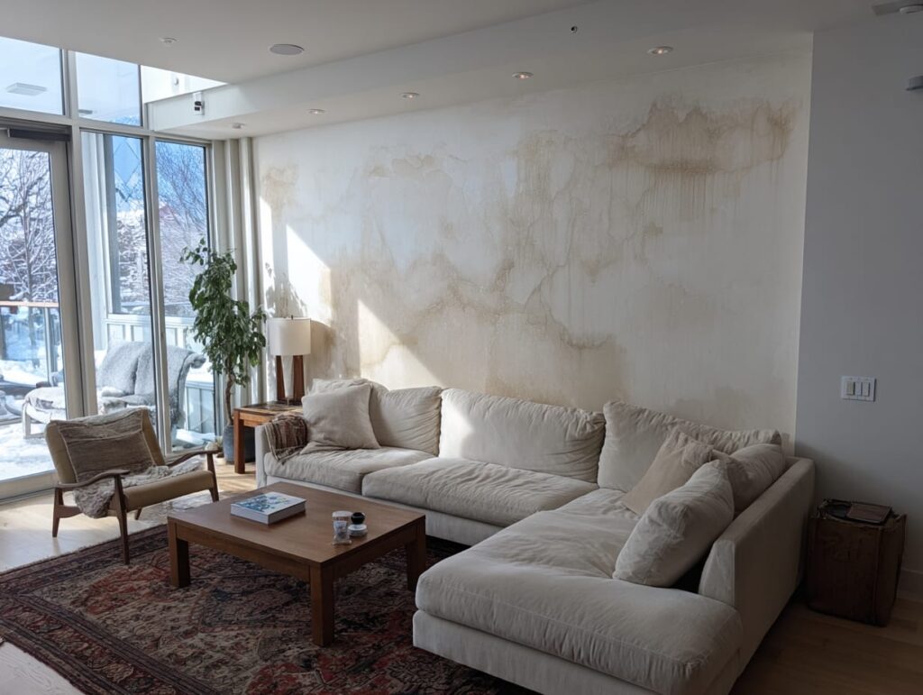 bc house subtle water stain spreading on interior wall